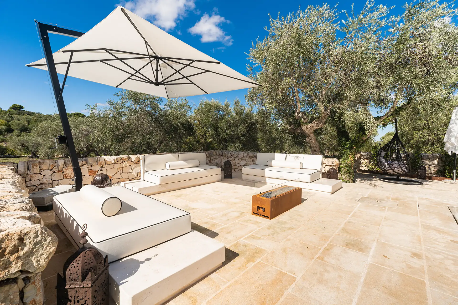 Outdoor living with gas-fired fireplace