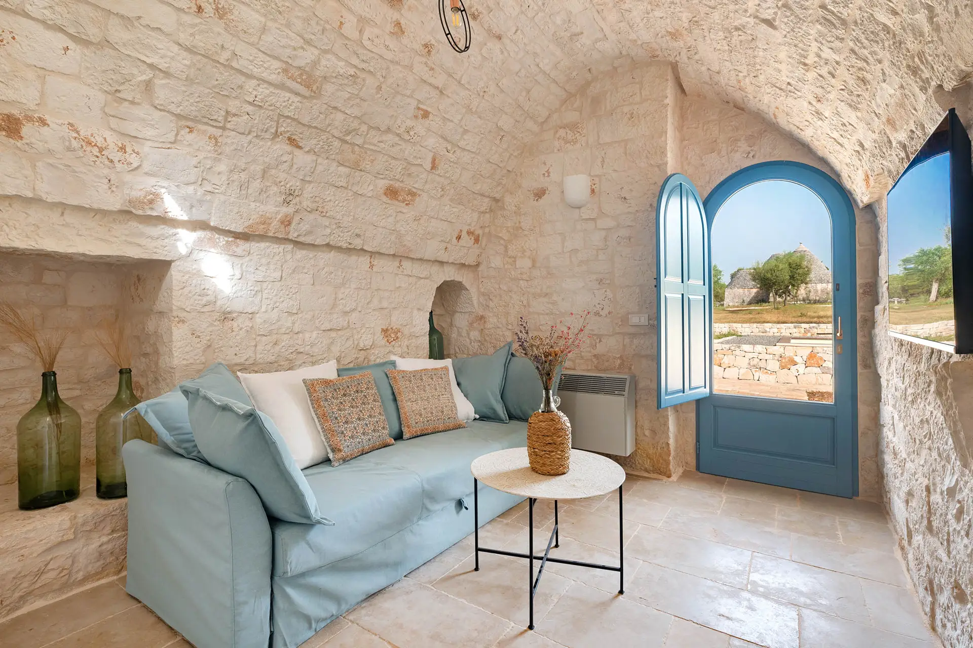 Private living of the suite with double sofa bed